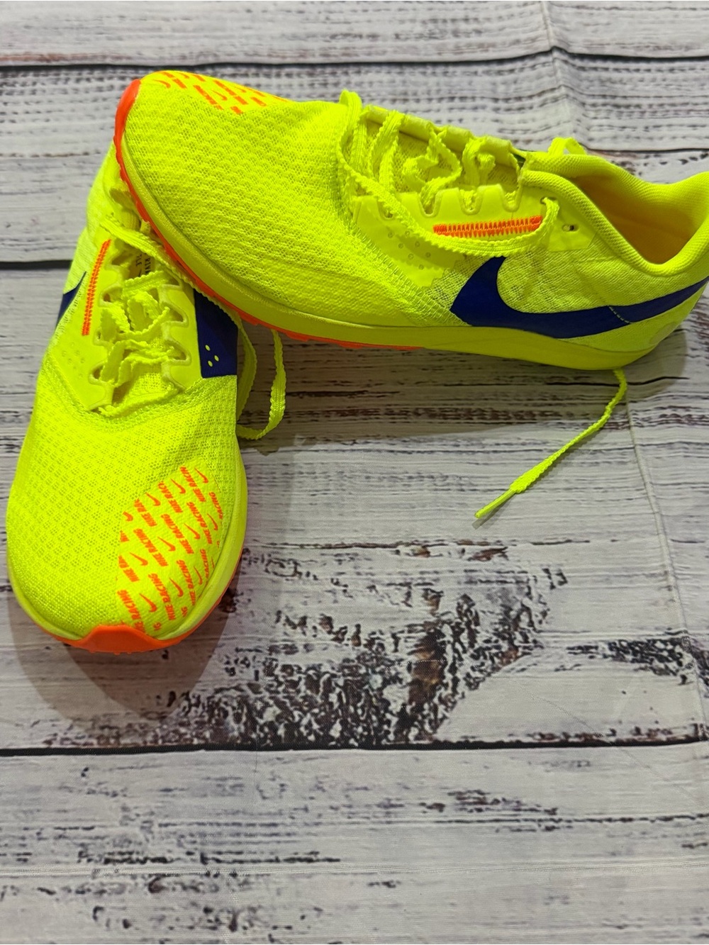 Nike women’s  Neon Yellow Running Sneakers with Blue and Orange Accents women 6
